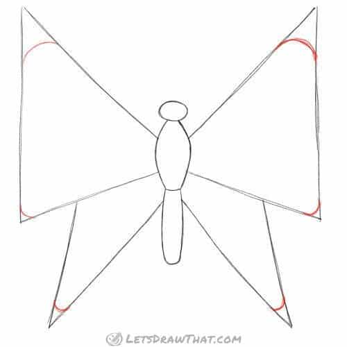 Drawing step: Round off the wings