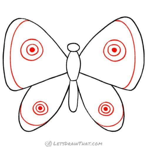 Drawing step: Add simple wing decorations