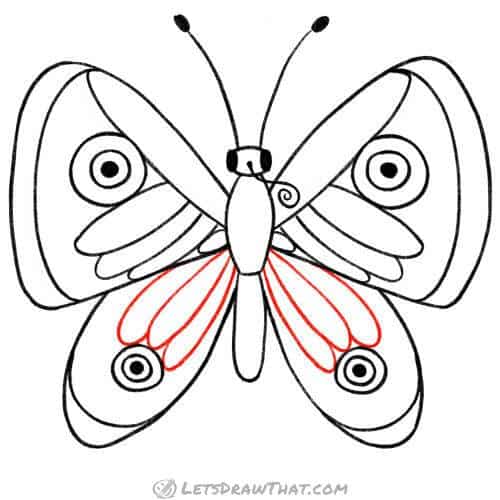 Drawing step: Add the base cell pattern to the hind wings