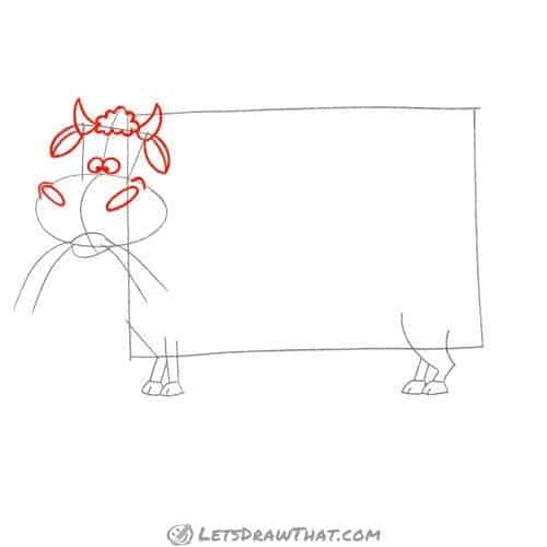 Drawing step: Draw the cow's head features