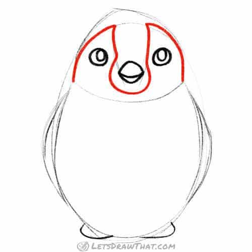 Drawing step: Draw the penguin’s face markings