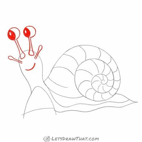 Drawing step: Outline the eyes and tentacles