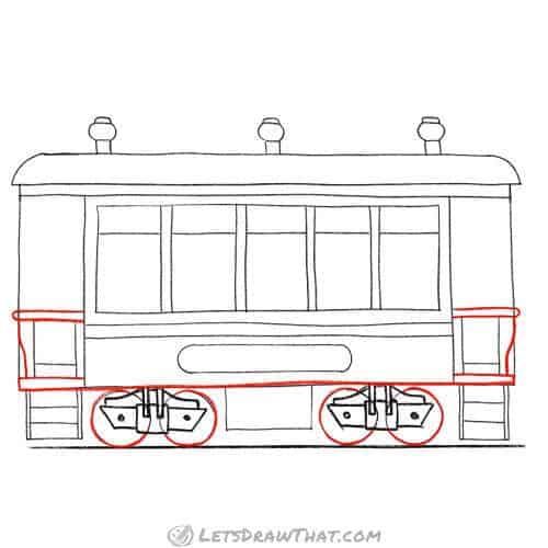 Drawing step: Outline the wheels and bottom of the wagon