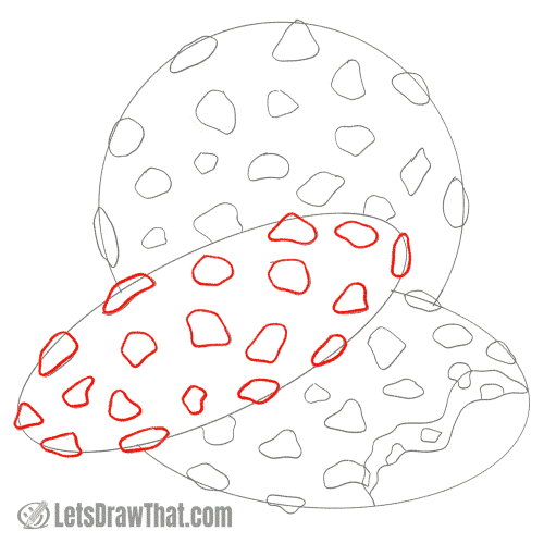Drawing step: Draw the chocolate chips on the cookie