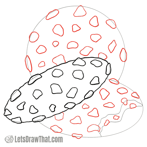 Drawing step: Draw the chocolate chips on the cookie