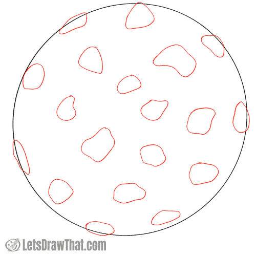 Drawing step: Sketch the chocolate bits on the cookie