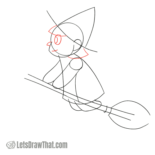 Drawing step: Sketch the witch's face and hair