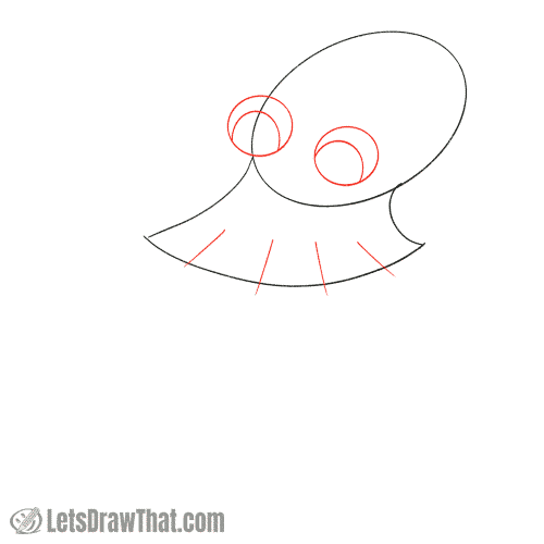 Drawing step: Draw large eyes and mark the tentacles